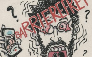 Links ein Mund in einem Handy, der aus vollem Hals „BARRIEREFREI“?? schreit, dass der Person mit Brille, schwarzen Haaren und Bart durchgeschüttelt wird.